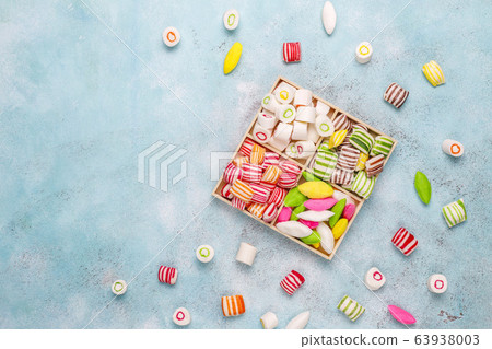 Different colorful sugar candies,top view Different colorful sugar candies,top view 63938003