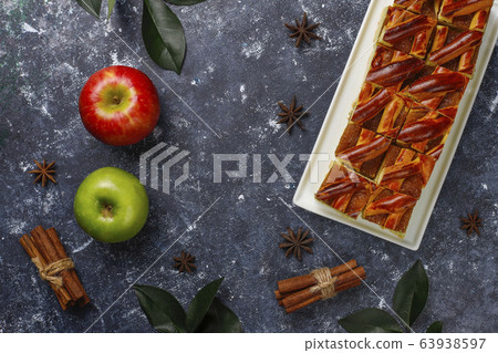 Homemade apple pie slices on dark background,top view Homemade apple pie slices on dark background,top view 63938597