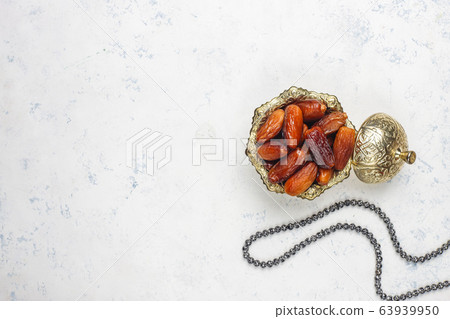 Beautiful bowl full of date fruits symbolizing Ramadan,top view Beautiful bowl full of date fruits symbolizing Ramadan,top view 63939950