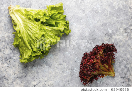 Fresh red lettuce on grey concrete background,top view 63940956