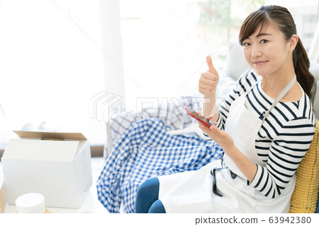 Women unnecessary goods smartphone 63942380