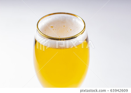 Close up of a cups of Stella Artois full of beer Close up of a cups of Stella Artois full of beer 63942609