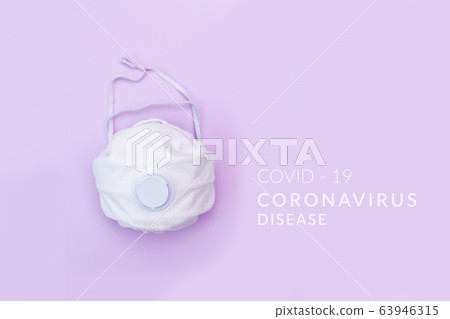 White medical mask on color background. A protection against pollution, virus, flu and coronavirus 63946315