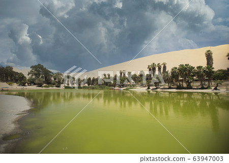 oasis of Huacachina in the desert of Ica 63947003