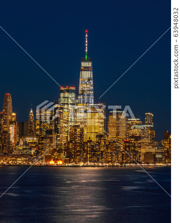 Lower Manhattan which is a apart of New york cityscape river side which can see One world trade center at twilight time, USA, Taking from New Jersey 63948032