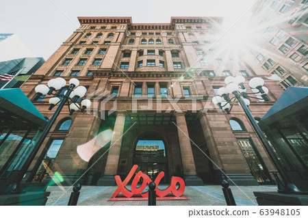 Philadelphia bourse building with sun flare, United States of America or USA, Travel Architecture and Landmark concept, Philadelphia bourse building with sun flare, United States of America or USA, Travel Architecture and Landmark concept, 63948105