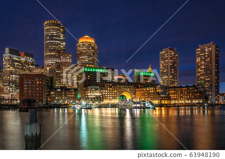 Scene of Boston skyline from Fan Pier at the fantastic twilight time with smooth water river, Massachusetts, USA downtown skyline, Architecture and building with tourist concept 63948190