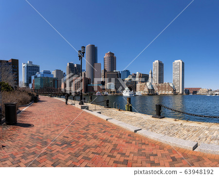 Panorama of Boston skyline from Fan Pier at the afternoon river side, Massachusetts, USA downtown skyline, financial district and harbor transportation, Architecture and building with tourist concept 63948192