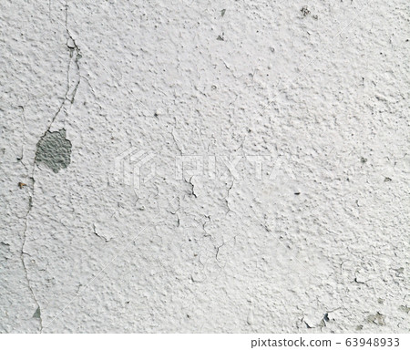 Stucco cracked on the wall as abstract background Stucco cracked on the wall as abstract background 63948933