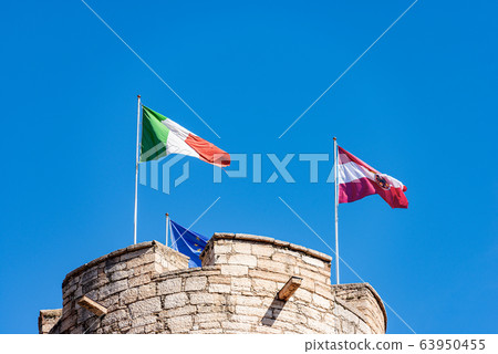 Flags on the castle - Castello del Buonconsiglio Trento Italy Flags on the castle - Castello del Buonconsiglio Trento Italy 63950455