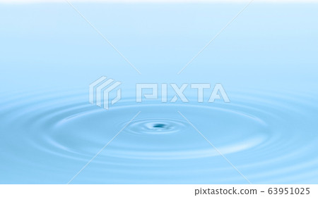 Water circle ripple, light blue water Water circle ripple, light blue water 63951025