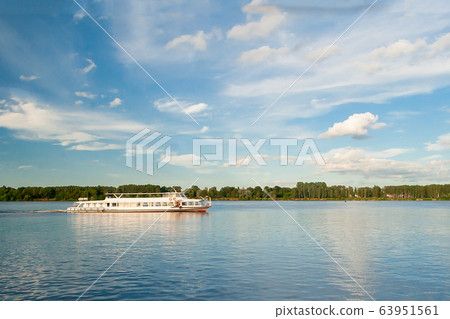 white tourist ship sailing on the river 63951561