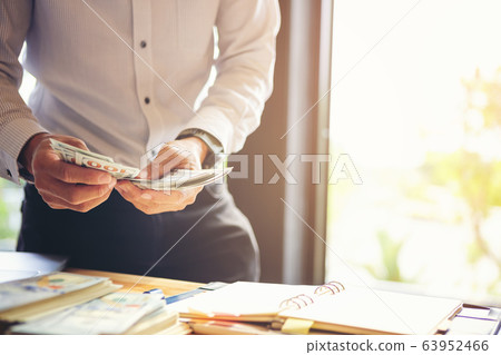 Attentive businessmen listen to business partners 63952466