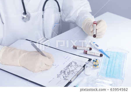 Doctor hands holding COVID 19 Coronavirus test 63954562