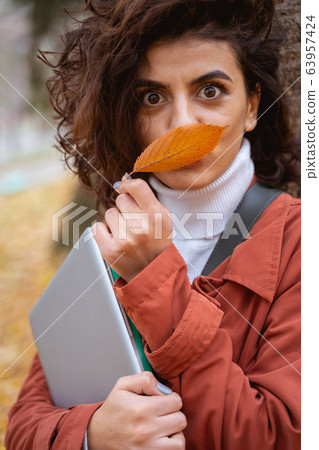 Having fun in autumn forest stock photo Having fun in autumn forest stock photo 63957424