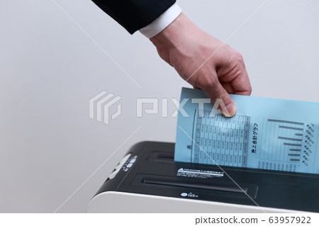 Shredder (office businessman work faceless copy space person electronics suit male) 63957922