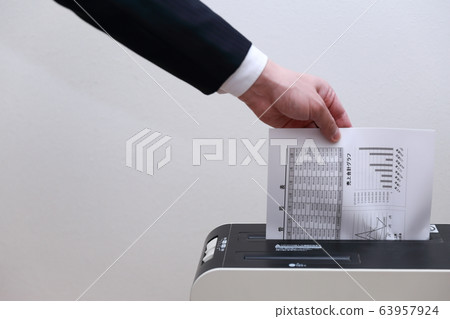 Shredder (office businessman work faceless copy space person electronics suit male) 63957924