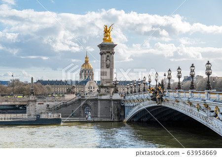 Dome des Invalides with Pont Alexandre III in Paris 63958669