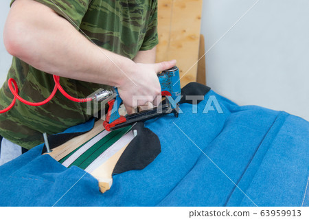 manufacture of upholstered furniture, furniture upholstery with a pneumatic stapler manufacture of upholstered furniture, furniture upholstery with a pneumatic stapler 63959913