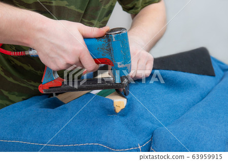 manufacture of upholstered furniture, furniture upholstery with a pneumatic stapler manufacture of upholstered furniture, furniture upholstery with a pneumatic stapler 63959915