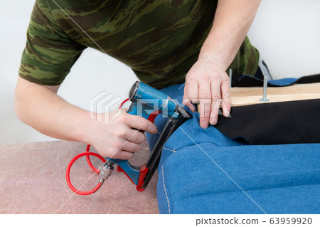 manufacture of upholstered furniture, furniture upholstery with a pneumatic stapler manufacture of upholstered furniture, furniture upholstery with a pneumatic stapler 63959920
