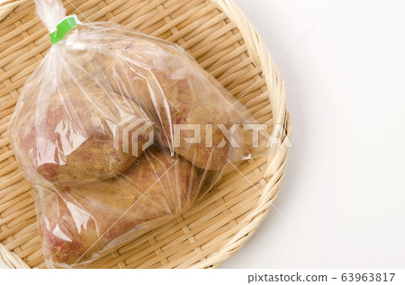 Crimson potato with soil bag Crimson potato with soil bag 63963817