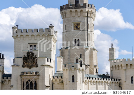 Exterior of the historic chateau Hluboka castle in Hluboka nad Vltavou, Czech Republic, sunny summer day 63964617