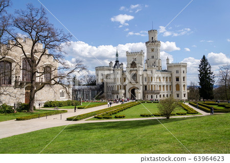 Exterior of the historic chateau Hluboka castle in Hluboka nad Vltavou, Czech Republic, sunny summer day Exterior of the historic chateau Hluboka castle in Hluboka nad Vltavou, Czech Republic, sunny summer day 63964623