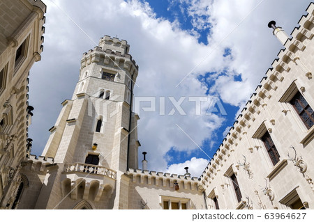 Exterior of the historic chateau Hluboka castle in Hluboka nad Vltavou, Czech Republic, sunny summer day 63964627