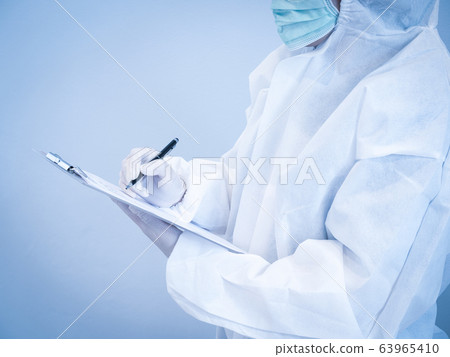 Asian doctor in personal protective suit wearing 63965410
