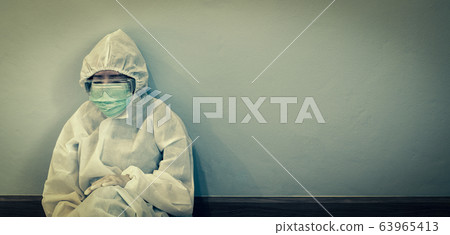 Asian female doctor, wearing personal protective 63965413