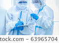 Asian woman doctor in personal protective suit 63965704