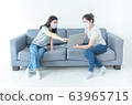 Asian women wearing masks working at home using 63965715
