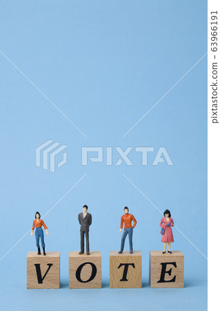 Miniature people voting Miniature people voting 63966191
