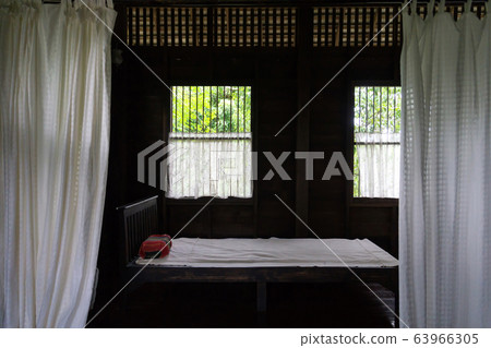 Traditional Thai style wooden bedroom, Chiang mai, 63966305