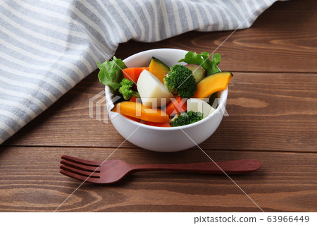 Hot vegetable salad table 63966449