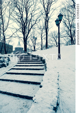 Riga city park in winter with snow 63966893