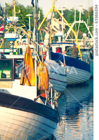 Latvian fishermen gather at sea in boats 63966894