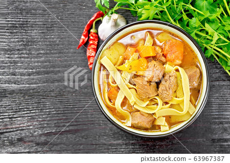 Lagman in bowl on black board top 63967387