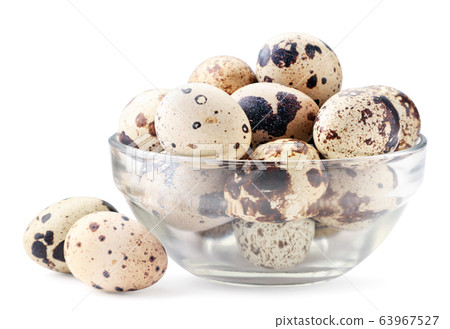 Quail eggs in a glass plate on a white. Isolated Quail eggs in a glass plate on a white. Isolated 63967527