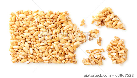 Puffed rice in pieces on a white. Isolated Puffed rice in pieces on a white. Isolated 63967528