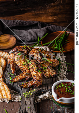 Grilled barbecue chicken wings 63968955
