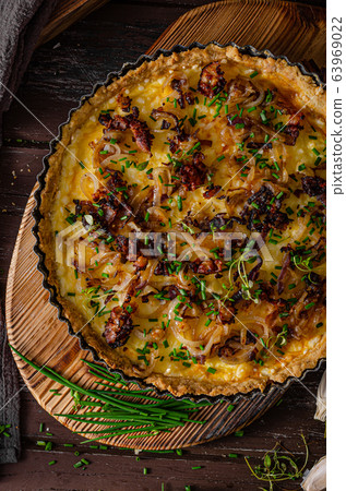 Homemade cheese quiche with onion and bacon 63969022