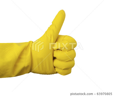 Yellow rubber glove for cleaning shows a gesture Yellow rubber glove for cleaning shows a gesture 63970805
