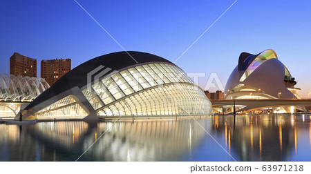Hemispheric building with reflections at dusk. The City of Arts and Sciences is an entertainment-based cultural and architectural complex and the the most important modern tourist destination in the c 63971218