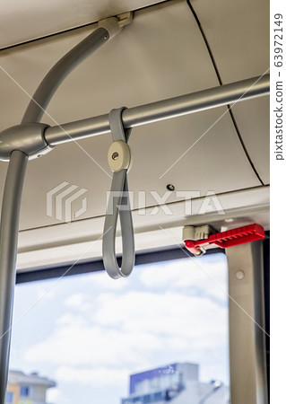 Empty gray bus handles Empty gray bus handles 63972149