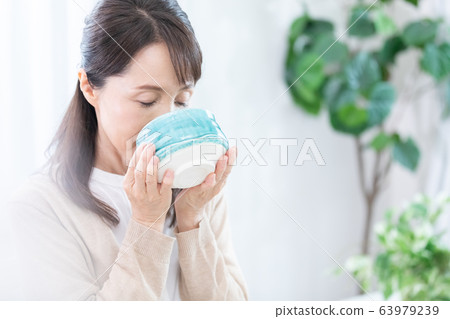 Middle woman Japanese sweets 63979239