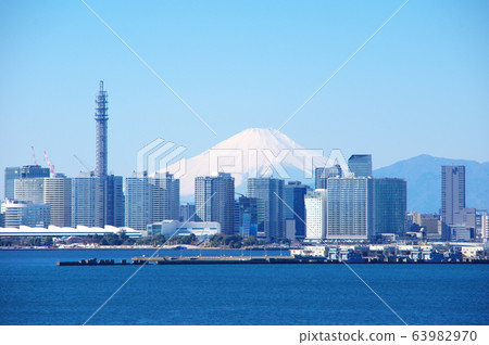 Mt. Fuji over the tower apartment in Minato Mirai, Yokohama 63982970
