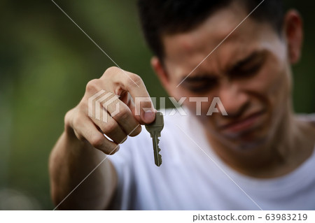 Men who pass the key while crying Men who pass the key while crying 63983219
