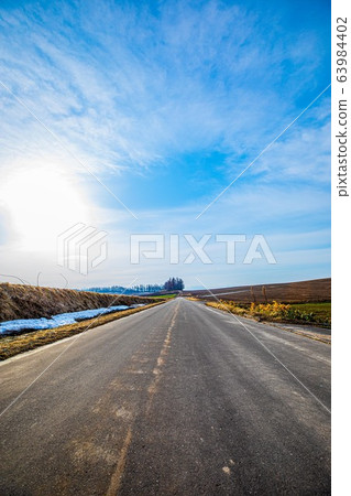 April: Spring Biei with snow 63984402